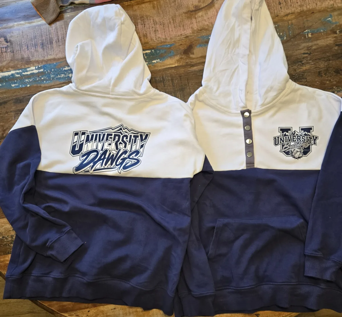 Two finished University Bulldogs hoodies, white and navy